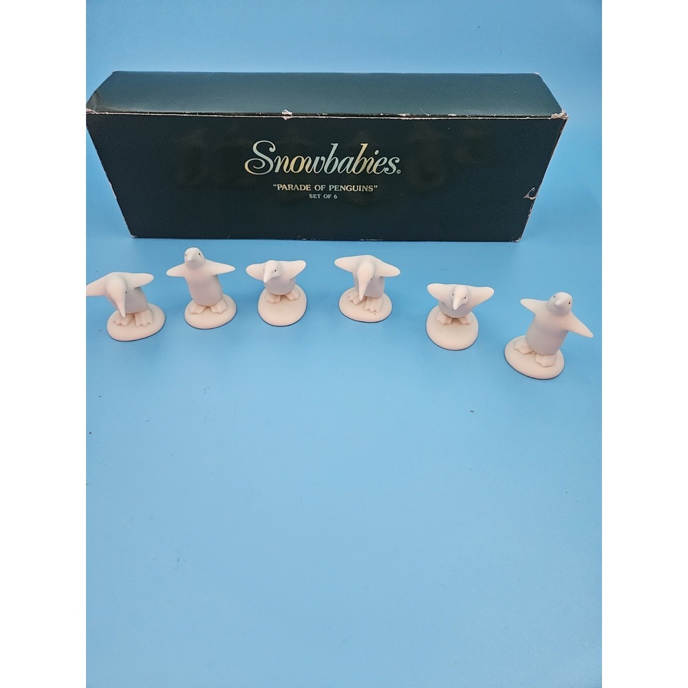 Dept 56 Parade Of Penguins